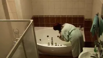 Wife caught masturbating while relaxing solo in the bath after work