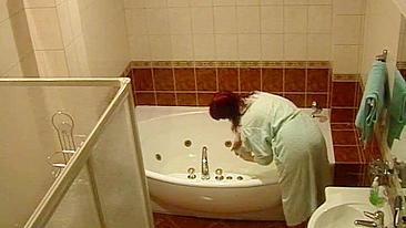 Wife caught masturbating while relaxing solo in the bath after work