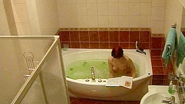 Wife caught masturbating while relaxing solo in the bath after work
