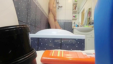Slender sister caught masturbating on hidden cam installed in bath