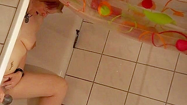 Sweet sister caught masturbating in the shower with help of water