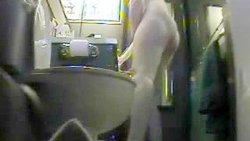 Man captures his naked wife who is caught masturbating in the toilet