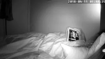 Curly-haired wife caught masturbating while watching porn in bed