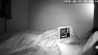 Curly-haired wife caught masturbating while watching porn in bed