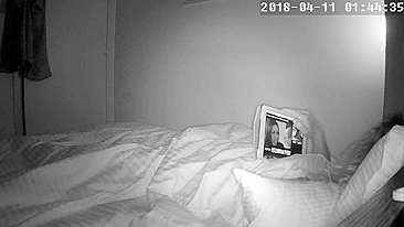 Curly-haired wife caught masturbating while watching porn in bed