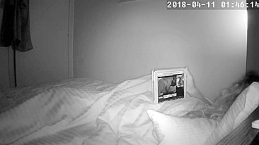 Curly-haired wife caught masturbating while watching porn in bed