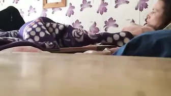 Mom isn't caught masturbating cause she stimulates twat under blanket