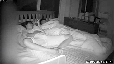 A spy camera caught my Asian wife masturbating while I was asleep