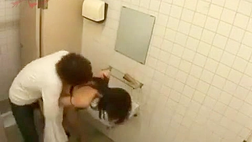 Screaming Asian babe gets forced to fuck In public toilet by rapist