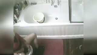 My horny mom masturbating in the bathroom sitting on the toilet