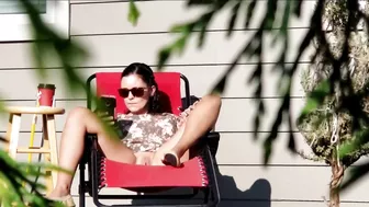I caught my neighbor wife naked sunbathing in the backyard and masturbating