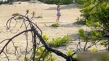 I peeping a tanning and masturbating blonde babe