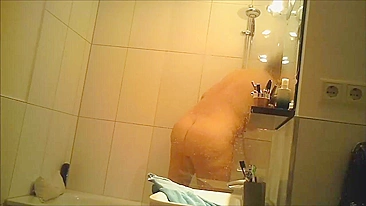 My mom shaves her pussy and masturbates in the shower XXX my spy cam