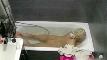Teen girl caught playing with herself on spy cam in the bath