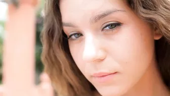 Two luscious naked girls pose for erotic XXX session in the rain