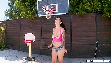 Hot brunette shows juicy XXX tits and ass while playing basketball