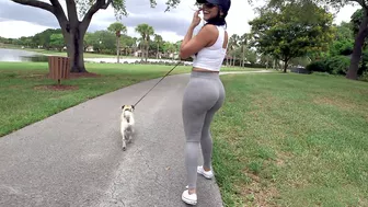 Whore pulls off leggins to expose XXX butt when walking with the dog