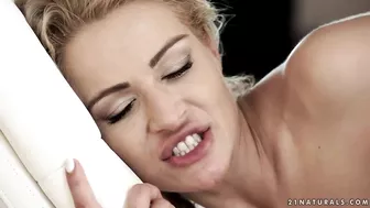 Chary Kiss gives asshole up to boyfriend on the white couch