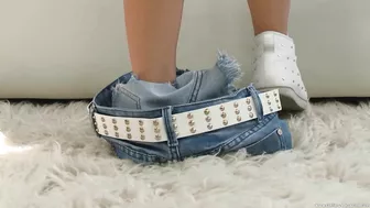 Captivating model Vanda Lust with blonde hair takes panties off, exposes pink sissy, and masturbates