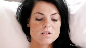 Brunette with freckles takes blue vibrator and masturbates pussy from behind