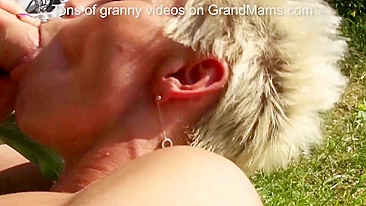 Young boy receives unexpected blowjob from short-haired blonde granny Victoria in the fresh air