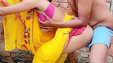 Mature aunty in the yellow saree cheating on her husband with local boy