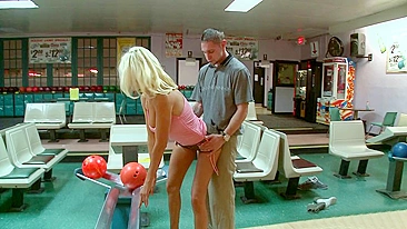 Busty blond porn diva keeps teasing amateur guy in the bowling club