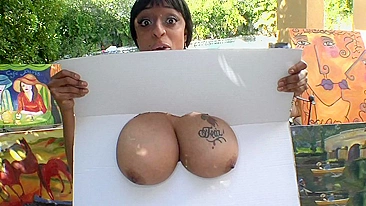 Black bombshell permits white guy to paint on her big XXX knockers