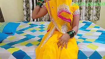 Smart aunty puts on yellow sari and with ease seduces her neighbor