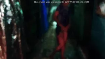 Lonely Bhabhi takes outdoor bath in the rain alone in the night