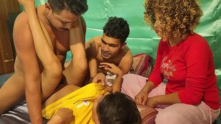 Curly-haired indian aunty enjoys the way two guys fuck her sister-in-law