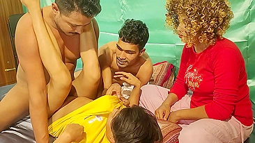 Curly-haired indian aunty enjoys the way two guys fuck her sister-in-law