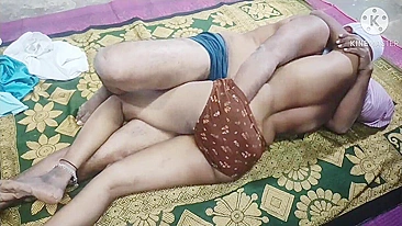 Desi guy undresses wife in green sari and fucks her peach on floor