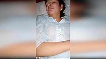Son shows his mom's pussy while she sleeps, INDIAN video leaked online