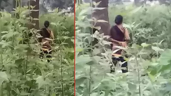 Indian bitch masturbates to orgasm while standing in the jungle