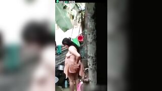 Bodacious Indian woman takes a bath in the amateur caught video