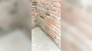 Man fucks Indian slut by brick wall and stops when they are caught