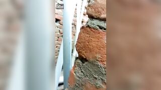 Man fucks Indian slut by brick wall and stops when they are caught