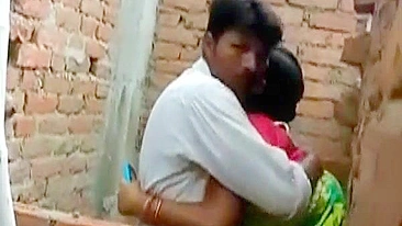 Man fucks Indian slut by brick wall and stops when they are caught