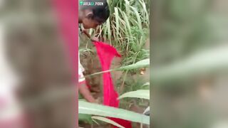 Horny Indian lovers hide in grass to have sex and film caught video