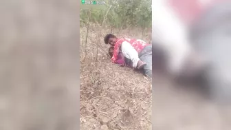 Outdoor caught video of clothed guy fucking Indian girl in missionary