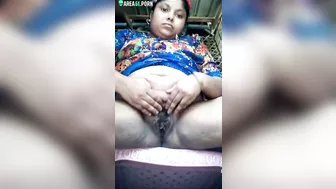 Chubby Indian webcam model in floral dress shows cunt in caught video