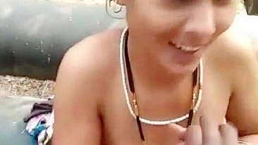 Attractive Indian bhabhi gives a blowjob being caught on phone camera