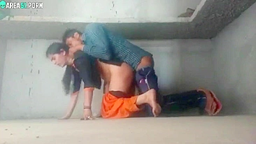 Clothed guy penetrates Indian girl's pussy from behind in caught video