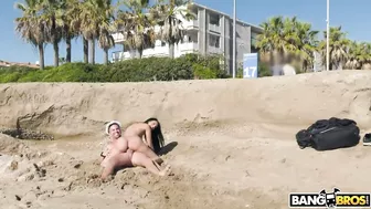 Man fucks brunette MILF with XXX shaped hooters on the deserted beach