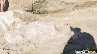 Man fucks brunette MILF with XXX shaped hooters on the deserted beach