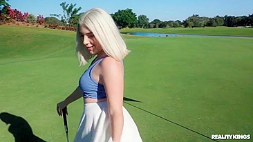 XXX striptease by shameless blonde chick takes place in the golf field
