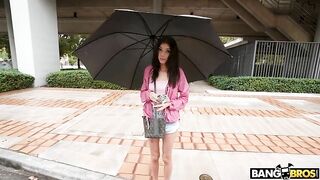 Brunette mom with umbrella is getting picked up on the XXX street