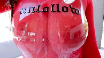 Sultry pornstar in red poses when having her perfect XXX body oiled