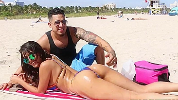 Curvy Latina gladly displays her phenomenal XXX booty on the beach
